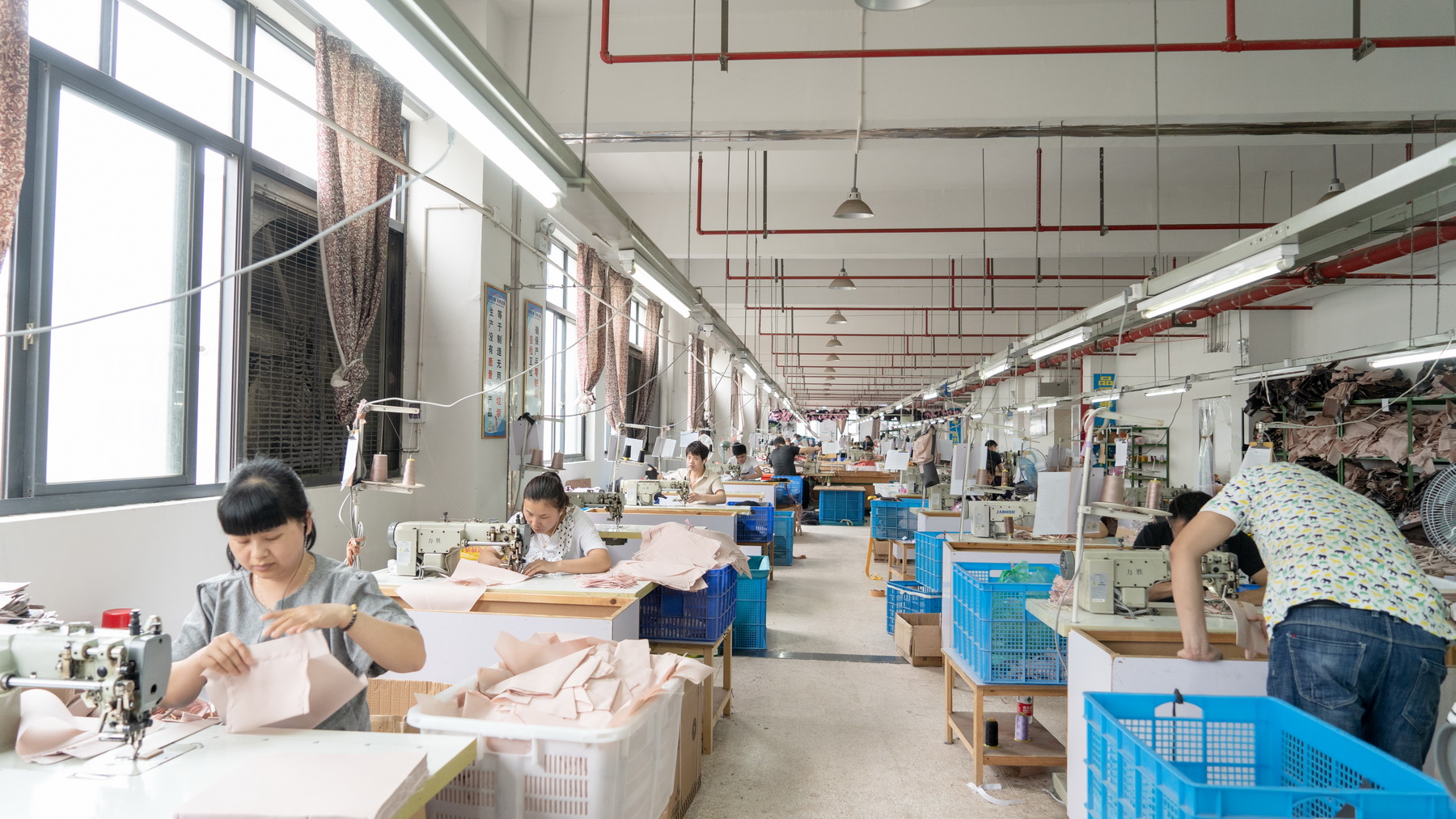 Wide view of the factory sewing floor